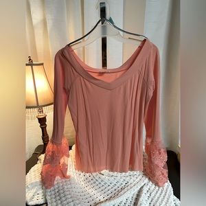 Stunning coral v neck top with lace bell sleeves